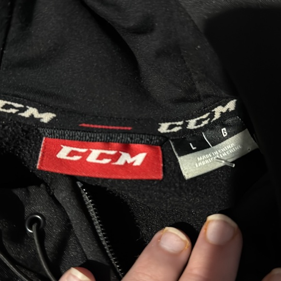 Black CCM zip up sweater size US Large, brand new - Picture 2 of 3